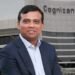 Cognizant CEO Ravi Kumar receiving award